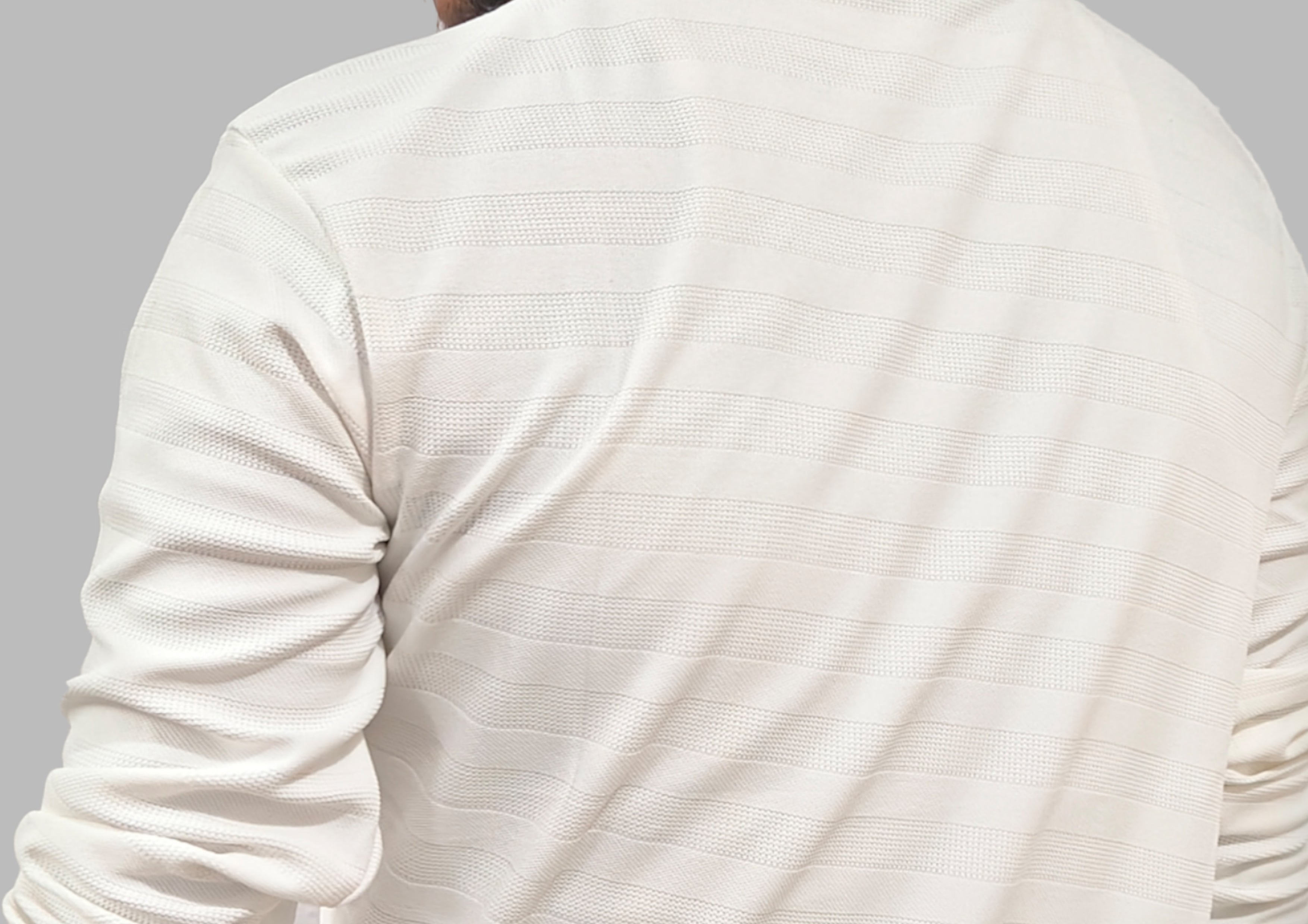 White long-sleeve shirt on a gray background