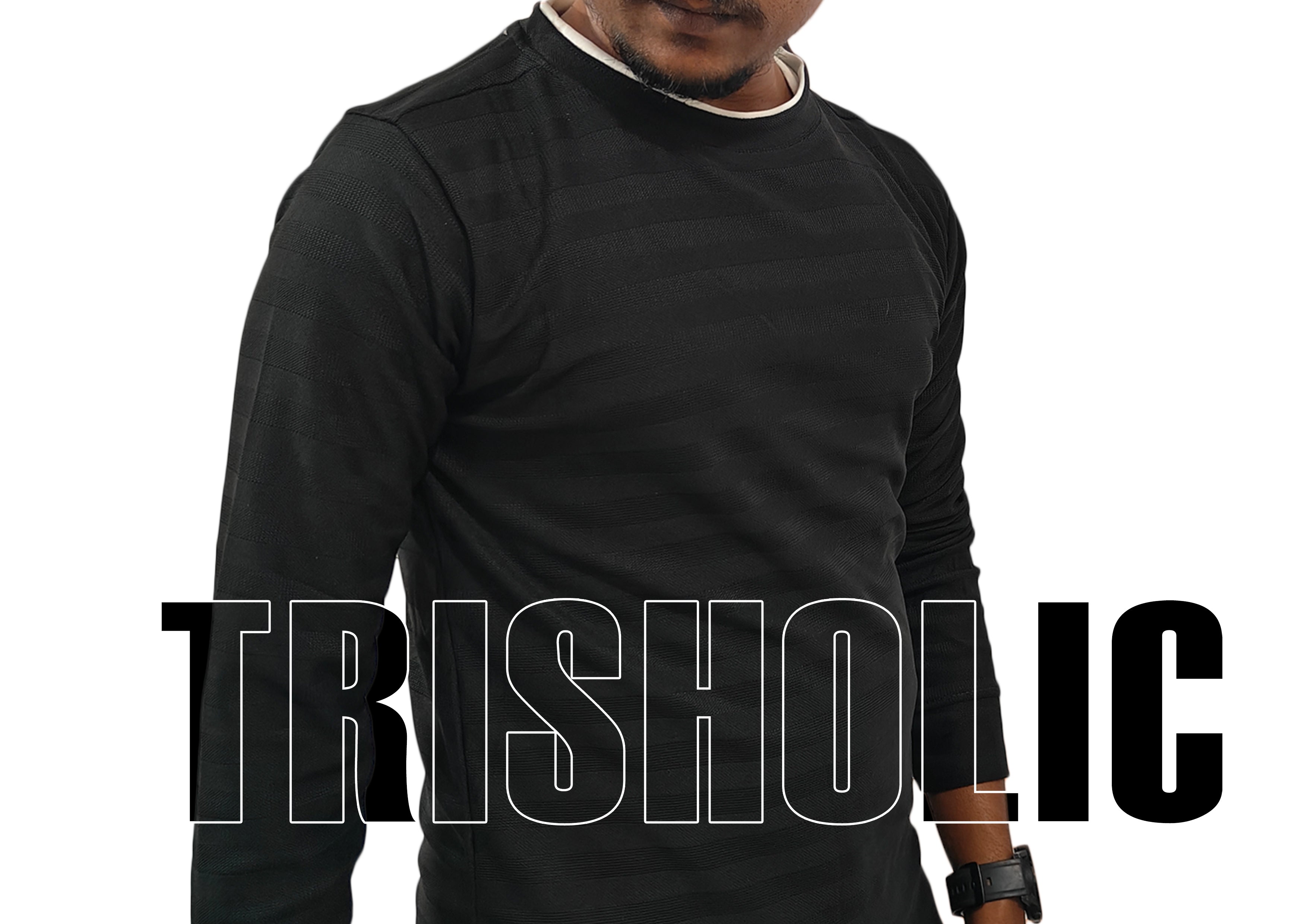 Person wearing a black long-sleeve shirt with 'TRISHOLIC' branding.