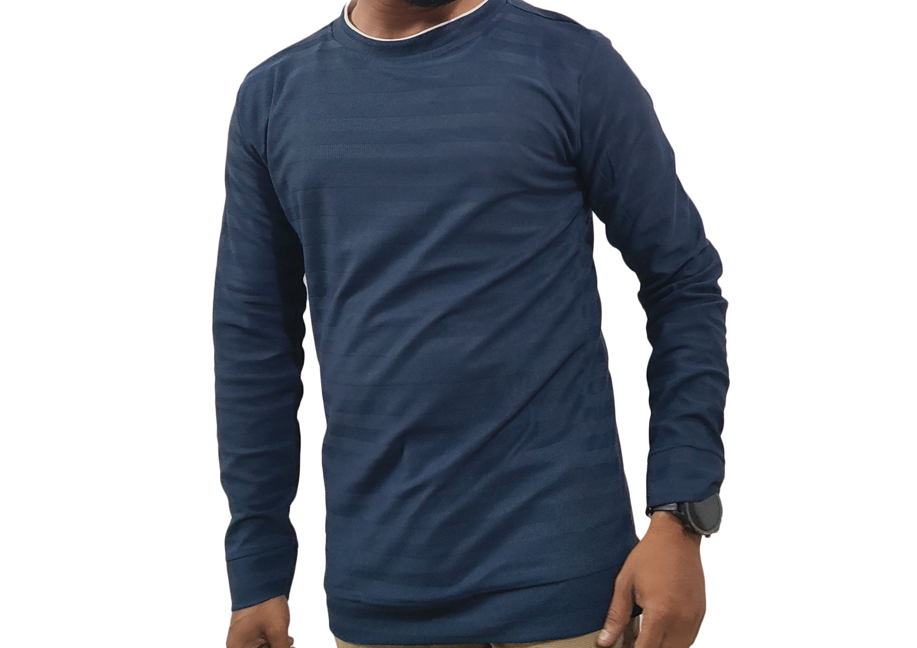 Person wearing a blue long-sleeve shirt on a white background