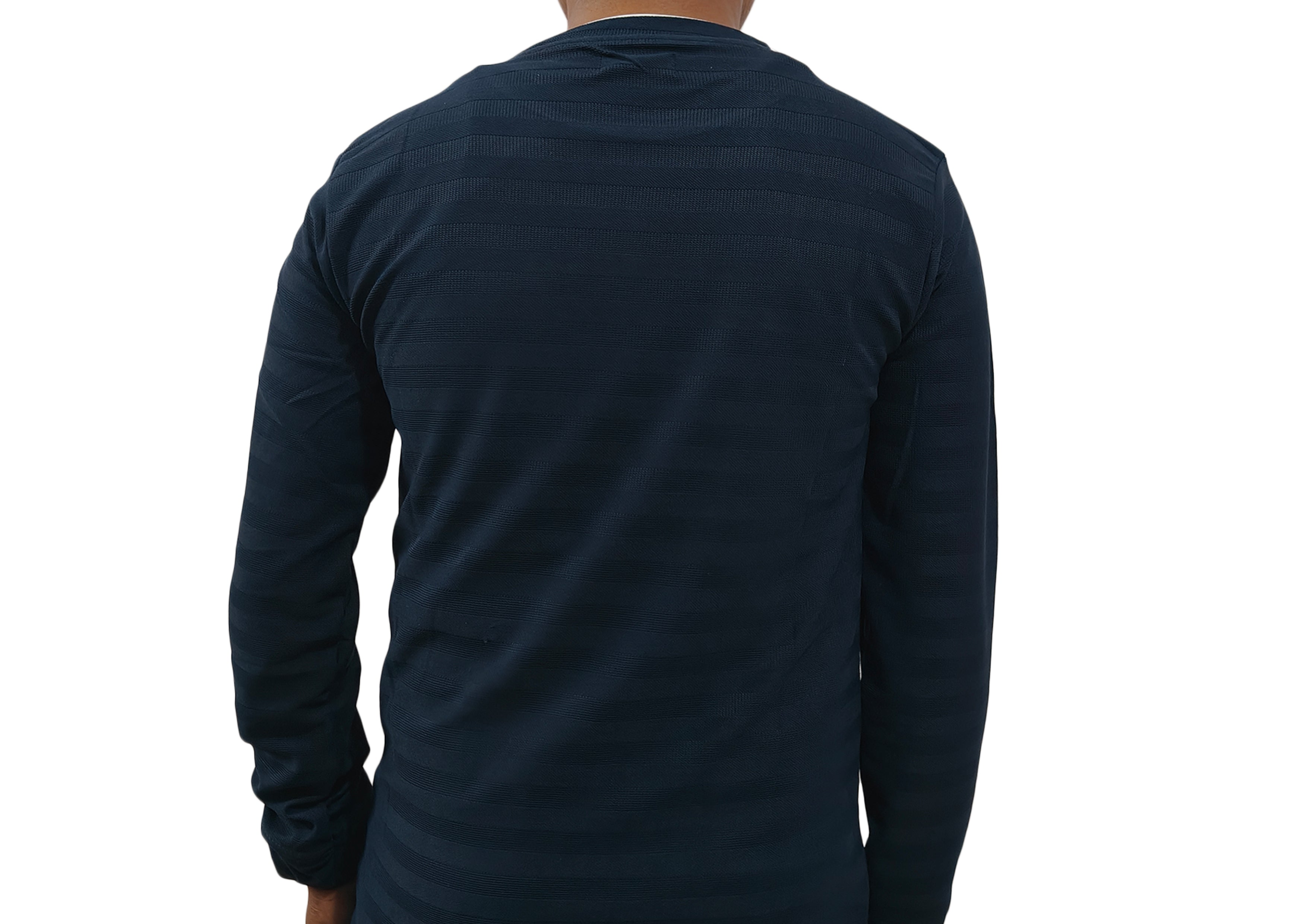 Navy long-sleeve shirt worn by a person on a white background
