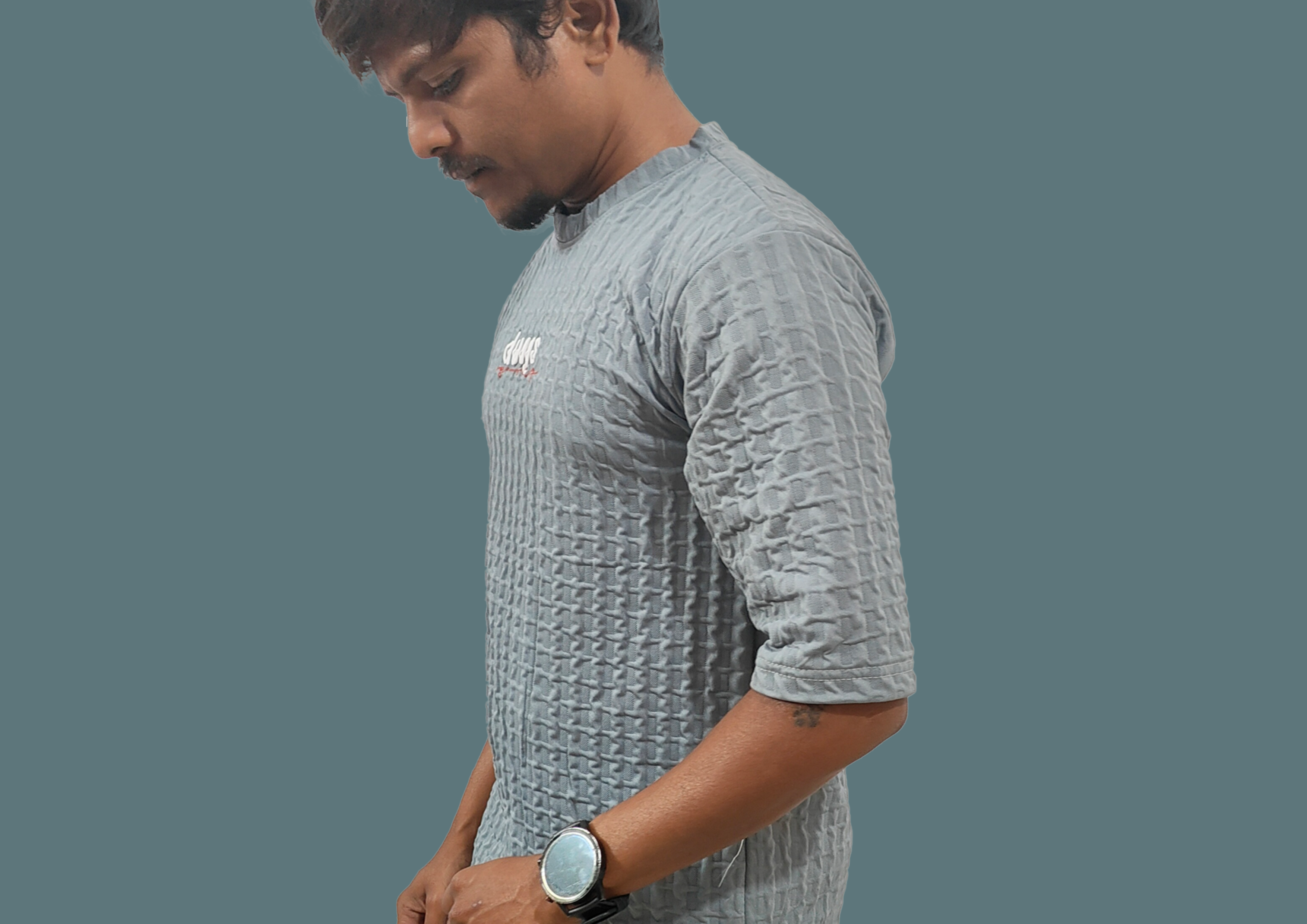 Man wearing a gray textured shirt on a transparent background