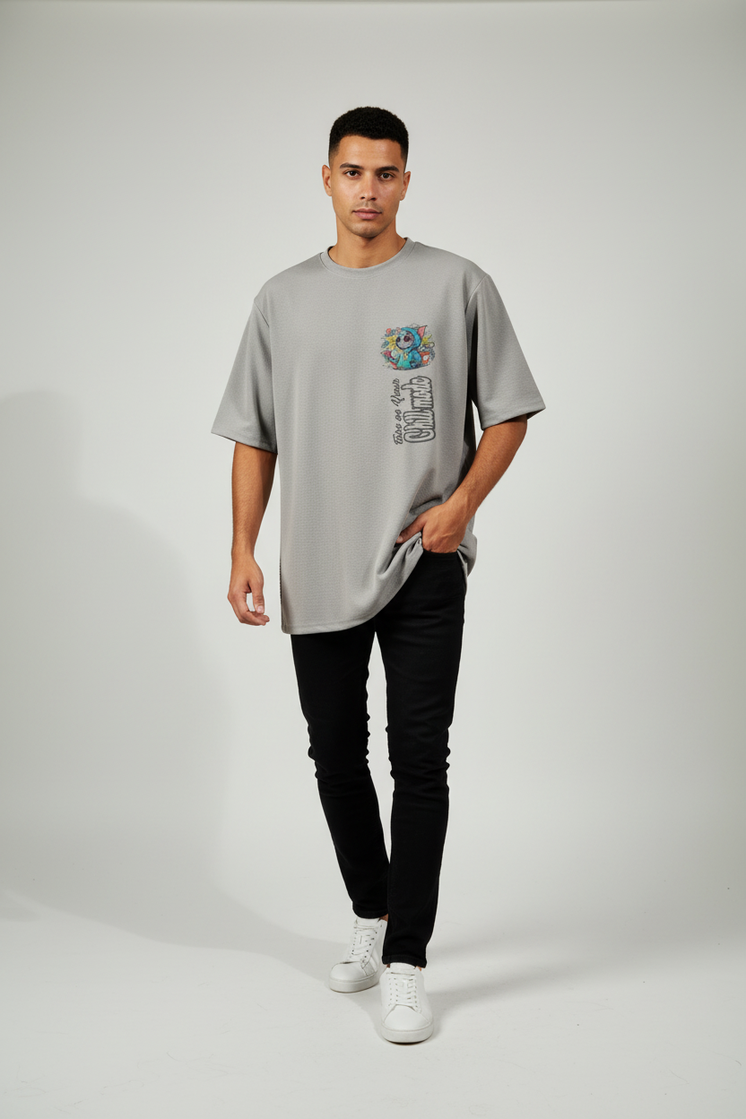 Front view of trendy gray loose fit men’s t-shirt featuring Chilling Vibe Tom graphic print, casual streetwear style by Trisholic.